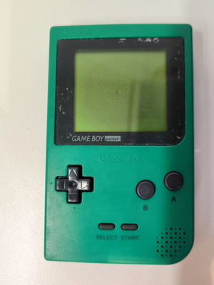 Game Boy Pocket Green console used with Test Drive 6 game