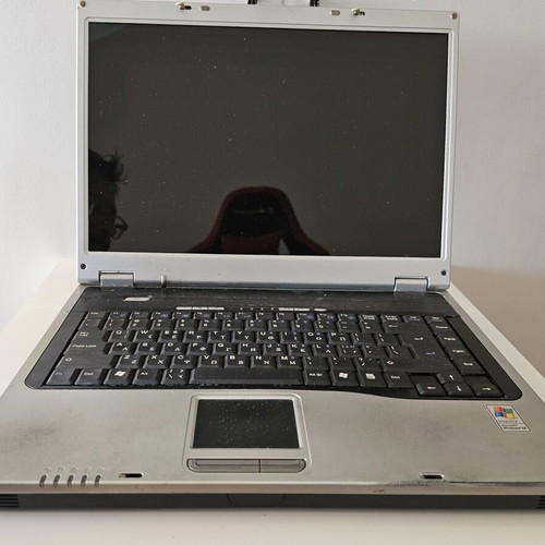 Innovator DX8000 laptop used for spare parts, no charger, faulty