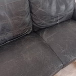 Two-seater leather sofa, medium condition