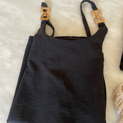 Pack of three shirts like new, two black and one semi-transparent sand color