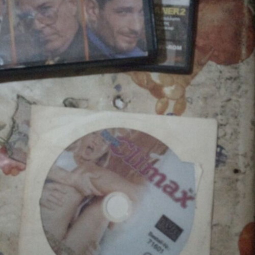 Package of four used erotic movies with Pamela Anderson DVD show