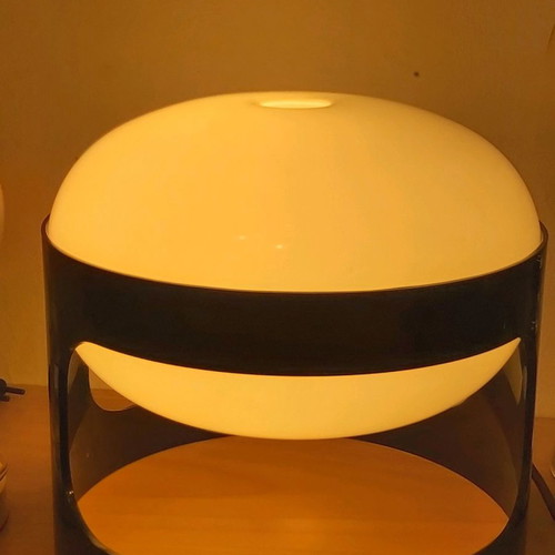 Lamp model KD 27 used, designed by Joe Colombo