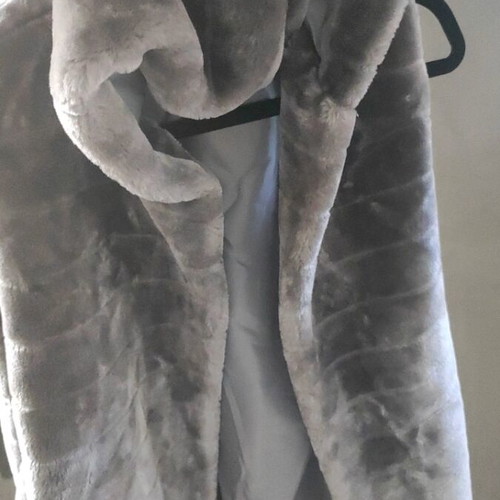Synthetic sleeveless grey fur with hood
