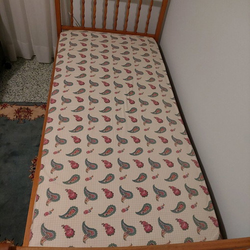Single solid wood bed used with new mattress