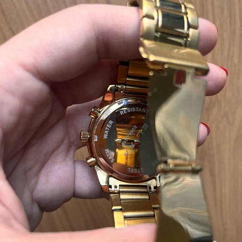 Elixa women's watch like new, gold bracelet with crystals