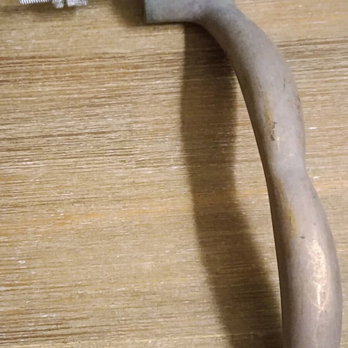 Pair of vintage brass door handles 1950 with natural patina used