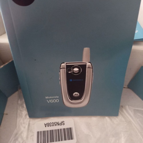 Motorola collectible cell phone like new, silver with flip cover