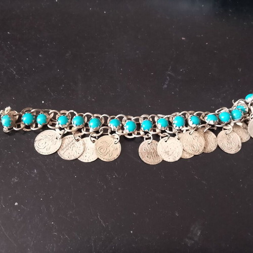 Antique children's talisman with Turkish coins and turquoise stones used