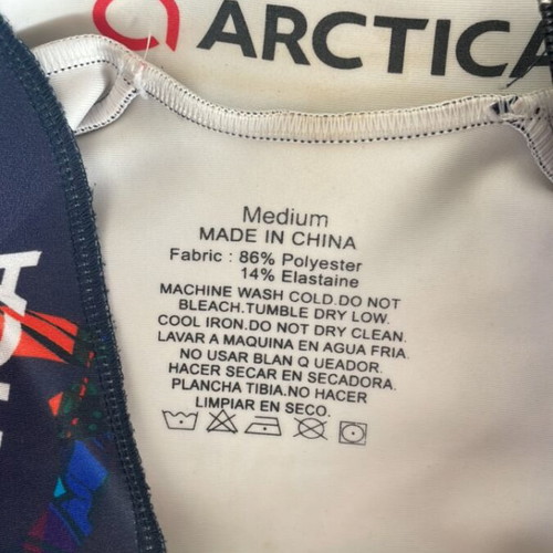 Arctica kids' racing ski suit used, size M, blue multicolor