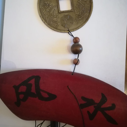 Melodos made of wood and metal with painted ideograms and Chinese zodiac new