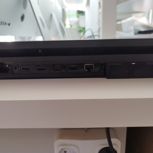 PlayStation 4 Pro with compatible controller like new