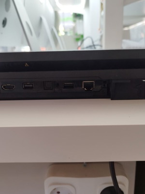 PlayStation 4 Pro with compatible controller like new