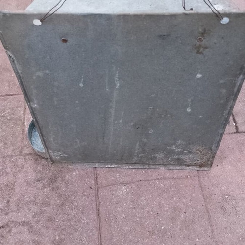 Vintage galvanized water storage with plastic tap used