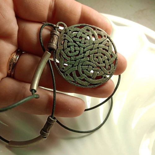 Pendant Celtic design like new with black adjustable leather strap