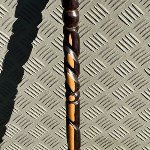 Handmade wooden walking stick used with lion head and spiral decoration