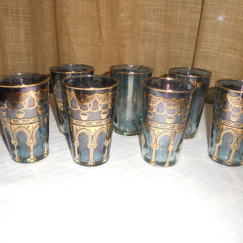 Set of 7 vintage blue-turquoise drinking glasses with gold Arabic decoration
