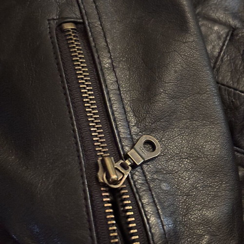 Leather jacket new with matching belt, unisex, black