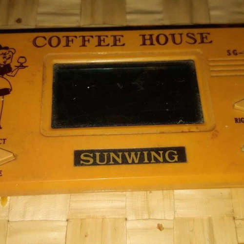 Coffee House Sunwing electronic game vintage used with original cover needs repair
