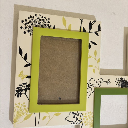 Wooden hanging photo frame with 4 slots, used