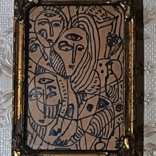 Small painting used in old metal tabletop frame with glass