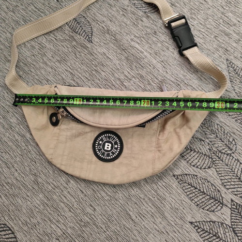 Beige waist bag like new with 3 compartments
