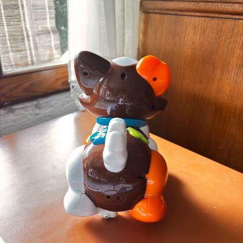 Colorful puppy toy on wheels designed by Clementini