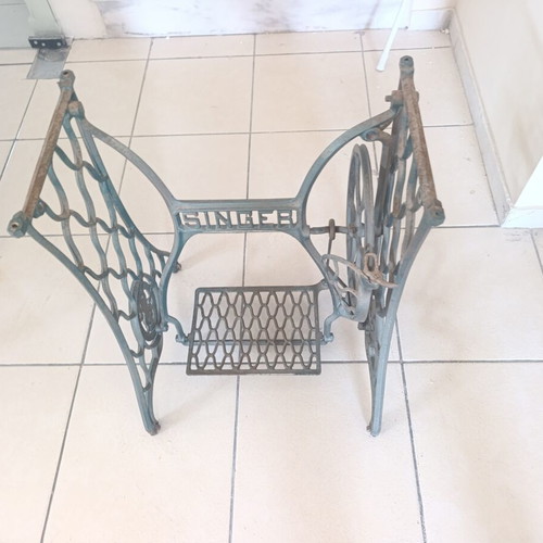 Vintage table console with Singer cast iron base and marble top used