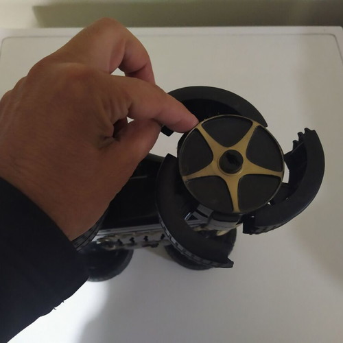 Remote control used with wheels that open to overcome obstacles