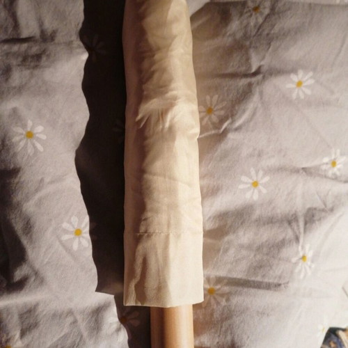 Beige umbrella like new with wooden handle and case