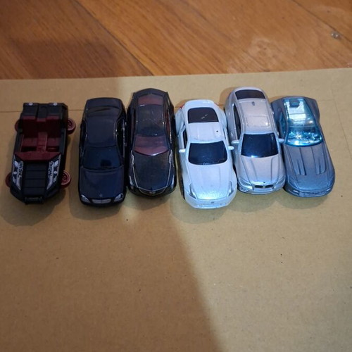 Set of black and white toy cars used
