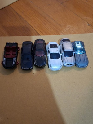 Set of black and white toy cars used