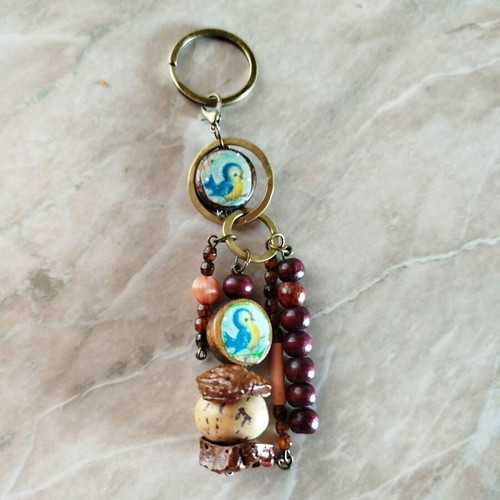Purse charm keychain new, handmade with wood beads and almond shells
