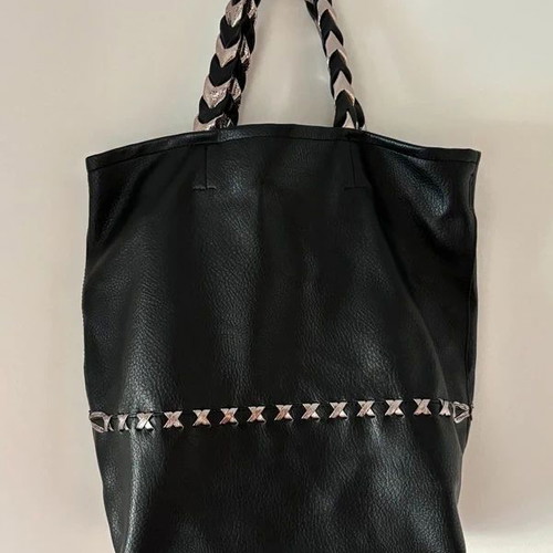 Black shoulder bag tote style like new with inner pockets and silver handle detail