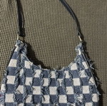 Denim bag with broken zipper