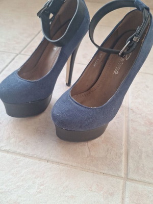 Heels with ankle strap used, dark blue with black heel and platform