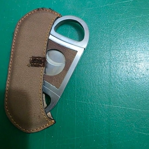 Luxury cigar accessory set with leather case and cutter
