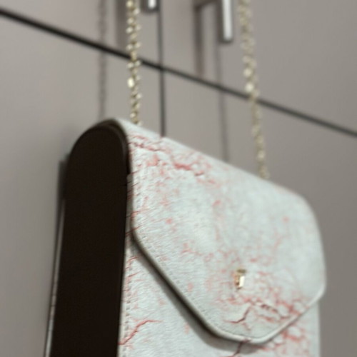 Axel bag new with marble effect and chain strap