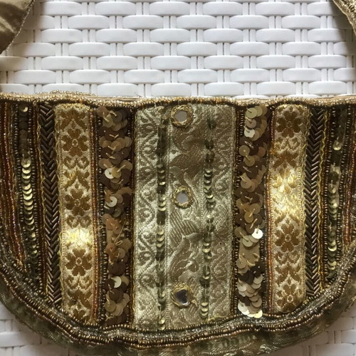 Small shoulder bag in gold colors like new