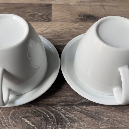 Set of 2 white coffee cups with saucers like new, minimal design