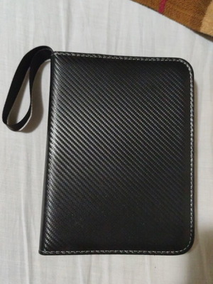 Premium coin binder new, holds 200 coins with expandable pages