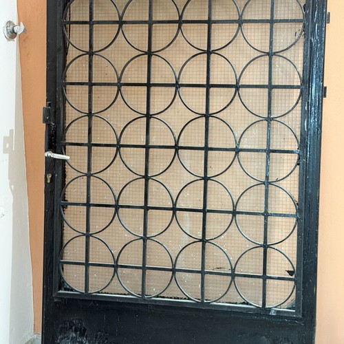 Solid iron door with panel, opening