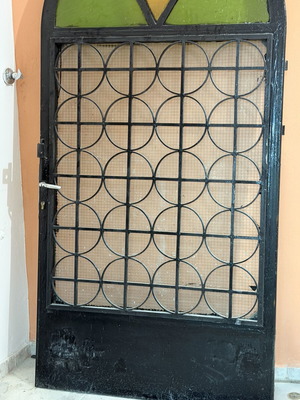 Solid iron door with panel, opening