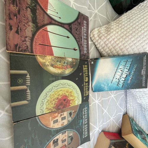 Adam Douglas books used, set of 4, English