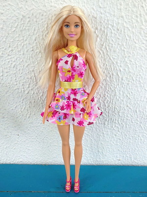 Barbie doll with floral dress like new Mattel