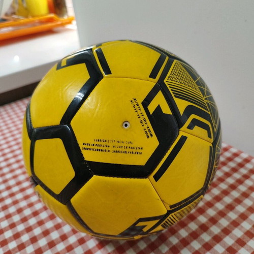 AEK Striker soccer ball like new, yellow-black, size 5