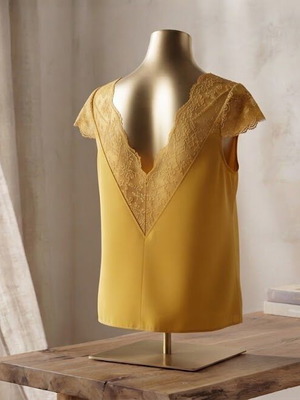 Designer mustard blouse with lace back, medium size