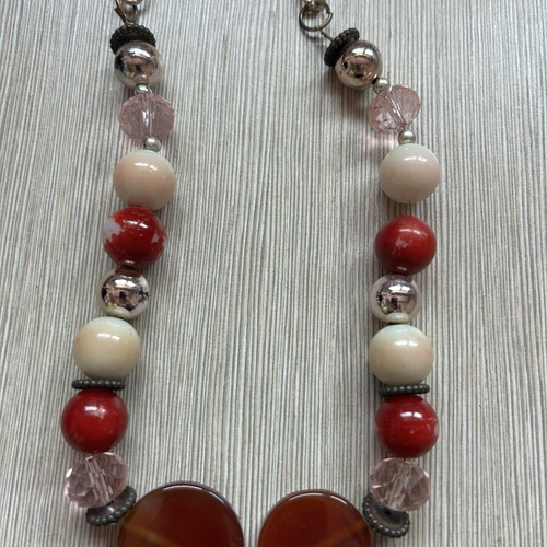 Necklace with red, ecru and pink beads used