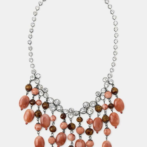 Waterfall style necklace with applique jewelry and colored stones