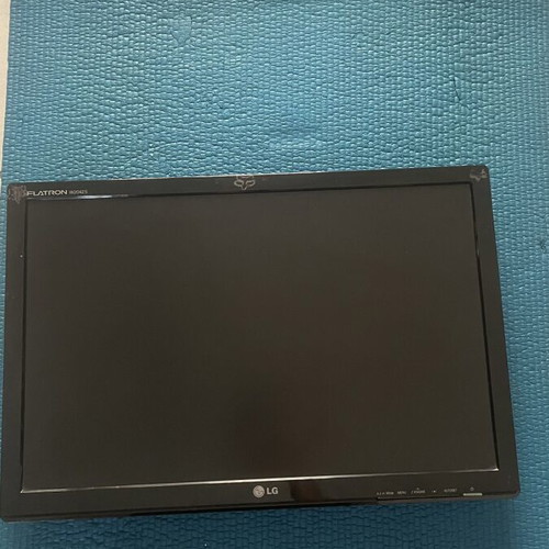 LG Monitor used with VGA and power cables, adjustable stand