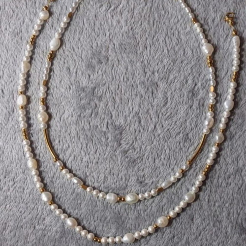 Steel necklace set like new, white and gold details